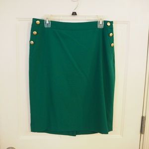 Bright green pencil skirt with gold button detail